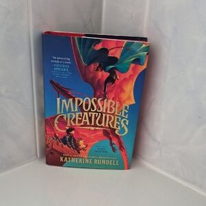 Impossible Creatures by Katherine Rundell - Vibrant Blue & Red Hardcover